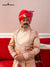 Elegant Modern Marwar sherwani angarkha set in peach with intricate embroidery and a traditional turban