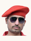 Default red wool beret cap online worn by a man with sunglasses for a stylish look
