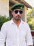 Default green fabric Bhati Lobo & beret cap combo by singh brand modern marwar worn by a man