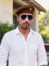 Default brown beret cap made of fabric, worn by a model, featuring Star Lobo & Beret Cap By Singh Brand