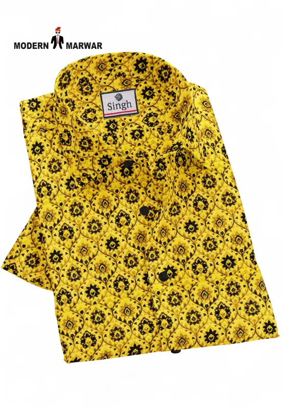 Singh yellow printed shirt for men with black floral pattern by SINGH folded neatly