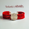 Solanki logo moli bracelet in red with decorative silver emblem for traditional wear
