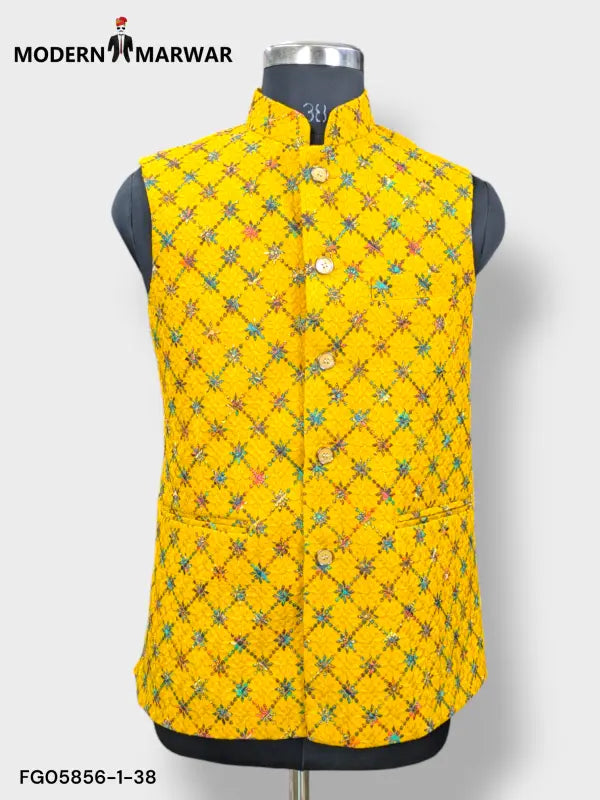 SPAADAA KOTI FF jacket by Modern Marwar in vibrant yellow with floral embroidery and button closure