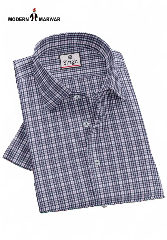 Modern Marwar folded Tommy Hilfiger men's shirt in plaid pattern with a crisp collar