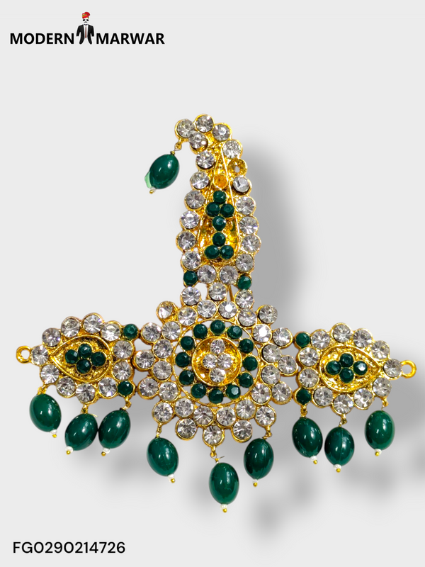 Traditional bejeweled brooch from Modern Marwar featuring intricate design and green accents