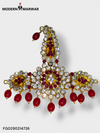 Traditional bejeweled brooch featuring intricate designs and vibrant red stones by Modern Marwar