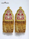 Traditional epaulette accessories in gold and red with intricate embroidery and tassels