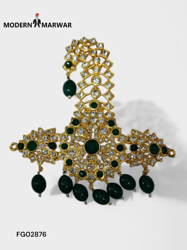 Traditional Indian jewelry featuring a peacock design with green stones and sparkling accents