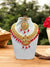 Stunning traditional jewelry set with red gemstones and intricate gold-tone detailing from Modern Marwar