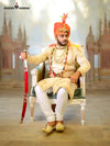 Elegant traditional men's sherwani in cream with intricate embroidery and regal accessories