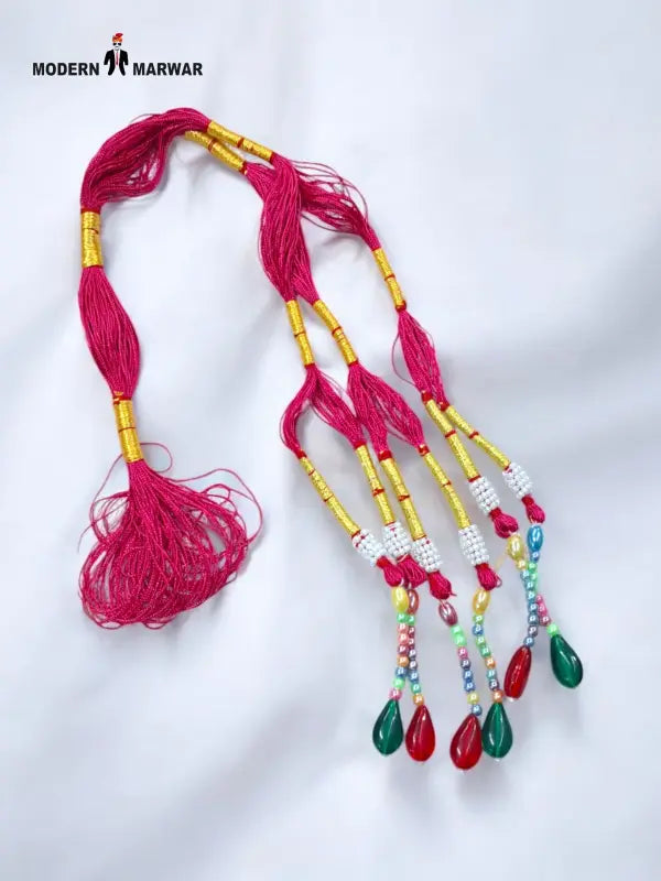 Colorful traditional talwar dori with beads and tassels for authentic ethnic styling