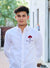 White men's Rajput design shirt with red embroidered logo worn by a young man