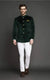 Green velvet coat suit for weddings featuring a stylish design and elegant buttons