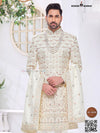 Elegant wedding groom sherwani combo in cream with intricate embroidery and contemporary design