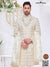 Elegant wedding groom sherwani combo in cream with intricate embroidery and contemporary design
