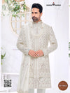 Elegant wedding groom sherwani combo in cream with intricate embroidery and matching dupatta