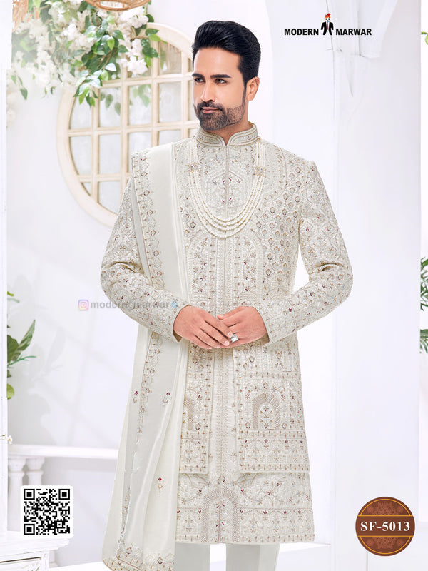 Elegant wedding groom sherwani combo in cream with intricate embroidery and matching dupatta
