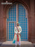 Elegant wedding groom sherwani in mint green with traditional embellishments and a matching turban