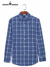 Stylish men's dress shirts collection featuring a blue checked shirt with a modern cut and comfortable fabric