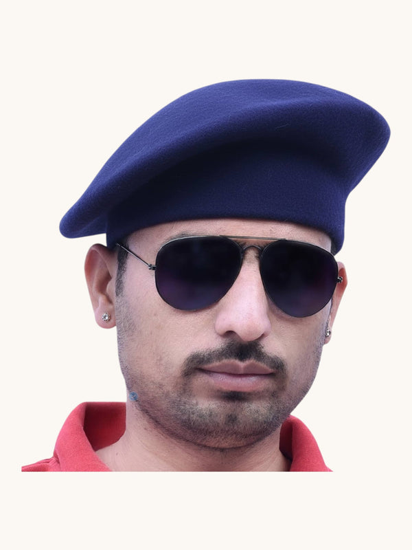 Default navy beret cap in wool from the side with sunglasses, available to buy beret cap online