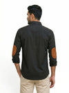 M Shirt in black fabric featuring Bhati logo-black with shirt from SINGH showcasing elbow patches
