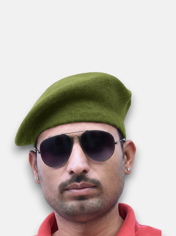 Default green wool beret cap worn by a man, featuring the Black Beret Cap & Star Lobo Combo