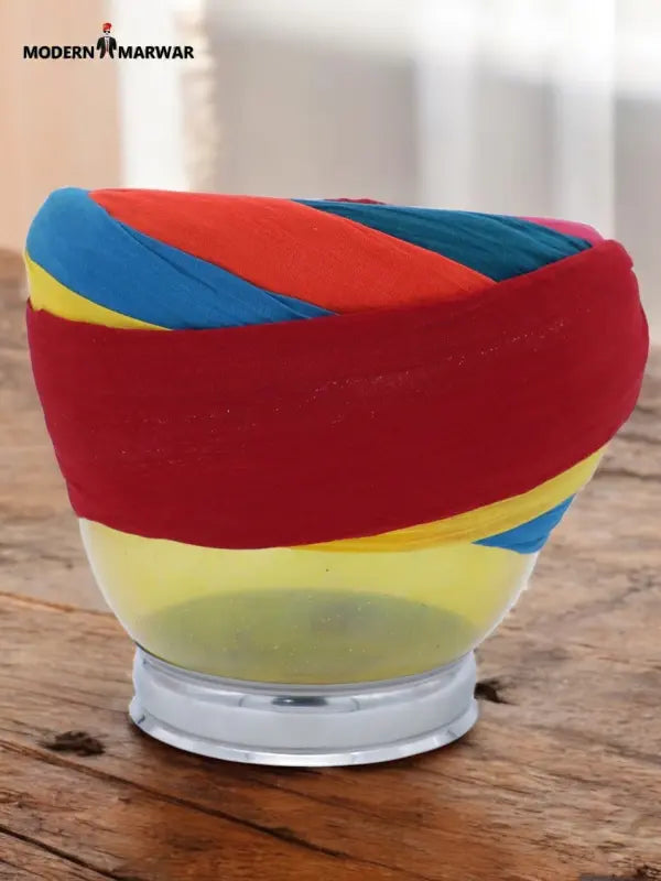 Colorful cotton safa turban by MODERN MARWAR featuring vibrant red and blue stripes