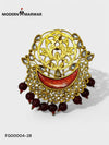 Intricate gold designer brooch for wedding attire adorned with red and sparkling gemstones
