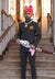 Elegant Jodhpuri suit with embroidered logo Jodhpuri, showcased with traditional accessories in a royal setting