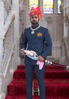 Man in Traditional Jodhpuri Suit with Embroidered Logo Jodhpuri and Colorful Turban Accessory