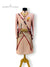 Elegant groom sherwani set in blush pink with intricate embroidery and regal accessories