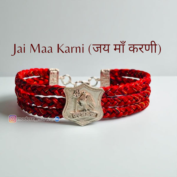 Beautiful Jai Maa Karni moli bracelet in vibrant red with a silver emblem for spiritual style