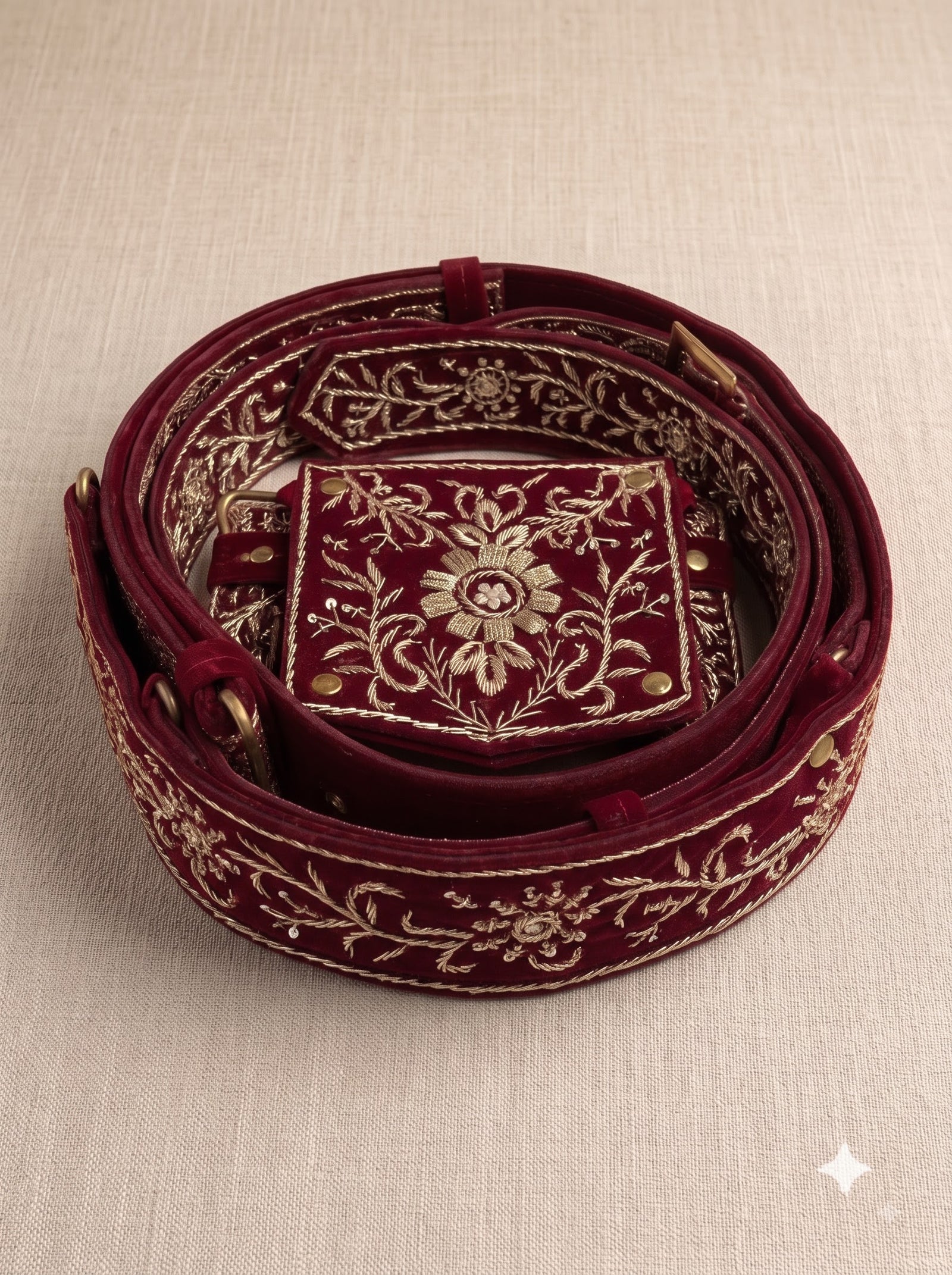 Embroidered burgundy velvet belt shown from above, featuring JARDOJI BELT-5600 design details