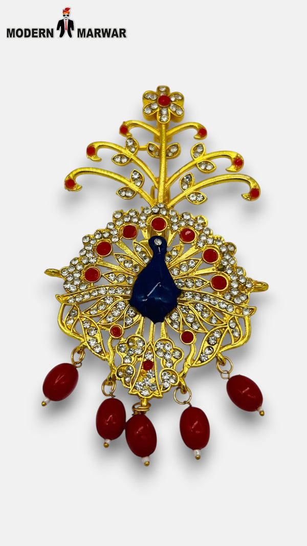 M HAND USE gold jewelry brooch with red stones and blue centerpiece KILNGI-3101-32
