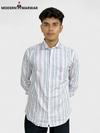 SINGH men's striped formal shirt featuring light blue and white vertical stripes worn by model