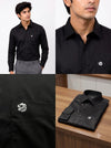 Men's plain shirt in black, made of cotton, shown from front and folded angle