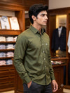 Men's olive green plain shirt in cotton, side view showcasing stylish design