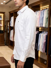 Men's plain shirt in white cotton fabric, side view showcasing stylish design