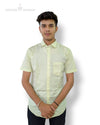 Singh men's printed short sleeve shirt in light yellow with subtle pattern worn by male model