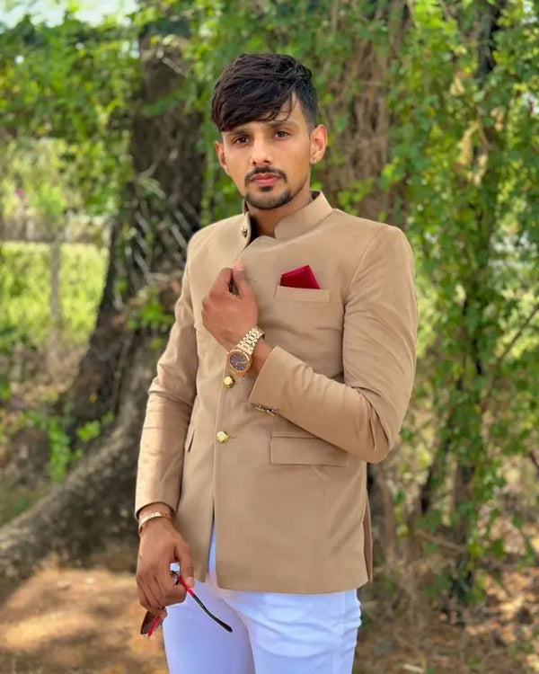 Stylish men's wedding coat suit in beige with elegant detailing and a pocket square for formal occasions