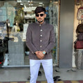 Stylish men's wedding coat suit in gray with traditional buttons, perfect for formal occasions