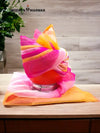 Vibrant men's wedding turban in pink and orange, perfect for festive occasions and celebrations