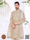 Elegant wedding groom sherwani set in cream with intricate embroidery, perfect for special occasions
