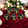 Set of five Modern Marwar deer logo button pins featuring golden deer designs on black backgrounds