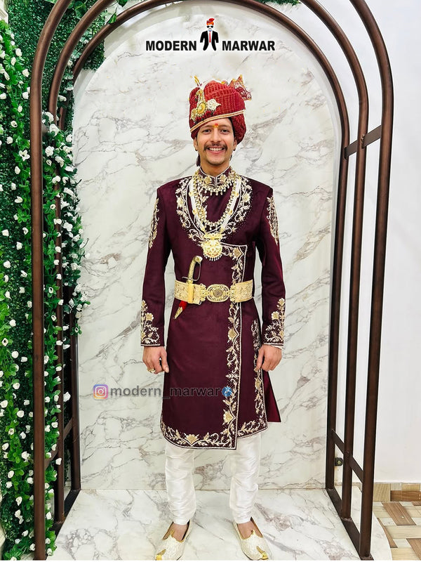 Modern Marwar designer maroon sherwani for men with intricate embroidery and royal accessories