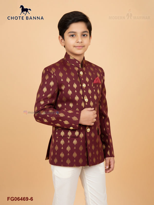 Elegant Jodhpuri suit for boys in maroon with golden motifs, perfect for festive occasions