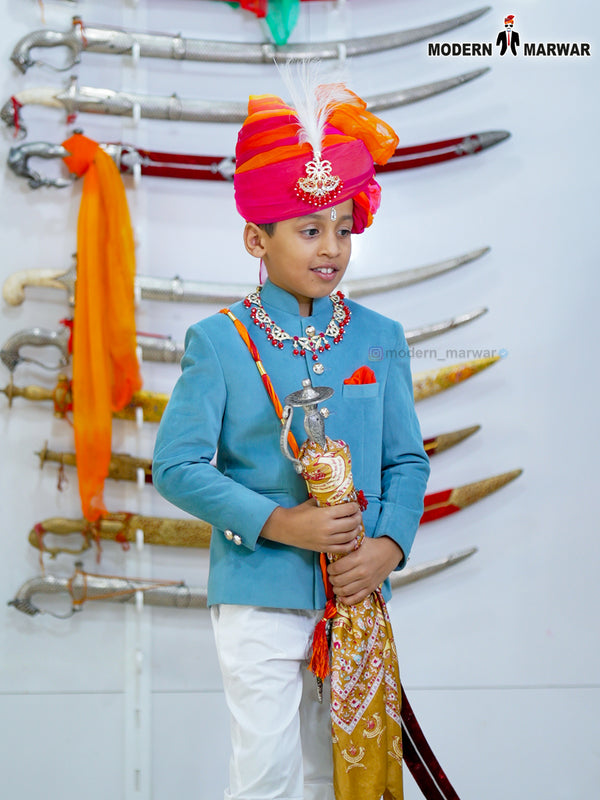 Kids Jodhpuri velvet coat suit in blue with decorative turban and sword for festive occasions