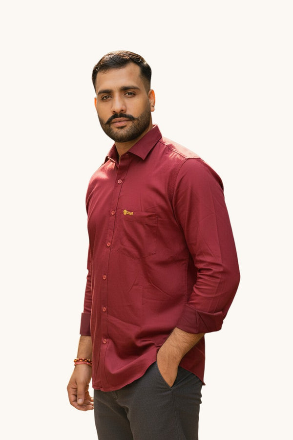 Modern Marwar men's maroon lycra shirt with a classic collar and button-up front. Features a chest pocket and adjustable cuffs.