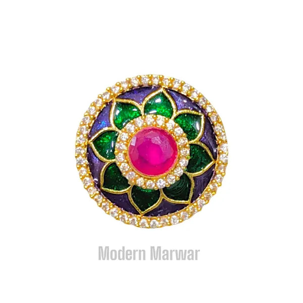 Traditional Indian button with intricate floral design and colorful gemstone embellishments