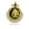 Traditional sarpech jewelry with intricate gold detailing and pearl embellishments